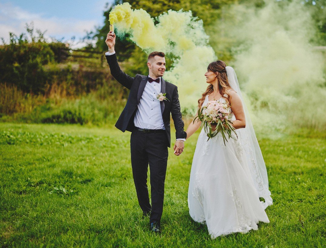 Pre-wedding shoot themes with red balloons and color smoke by FliqaIndia